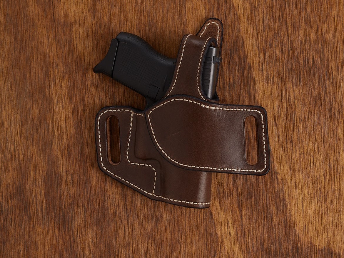 Glock G-42 LVL 2 OWB holster pattern — retention strap detail